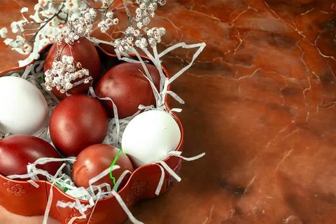 Easter background with Easter eggs and spring flowers. Top view with copy s.. Stock Photos