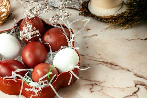 Easter background with Easter eggs and spring flowers. Top view with copy s.. Stock Photos