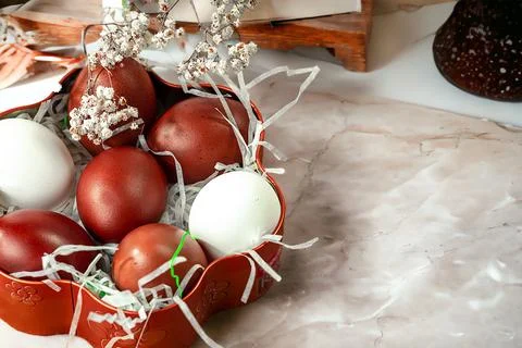 Easter background with Easter eggs and spring flowers. Top view with copy s.. Stock Photos