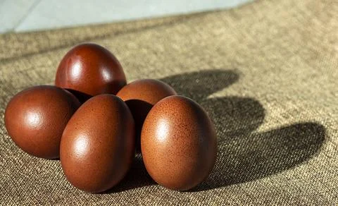 Easter background with Easter eggs on the table. Easter. Stock Photos