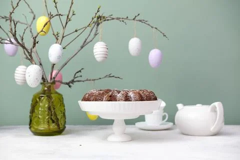Easter background with eggs and spring branches. Happy Easter. Table setting  Stock Photos