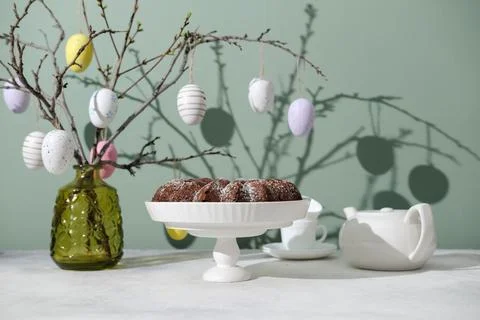Easter background with eggs and spring branches. Happy Easter. Table setting  Stock Photos