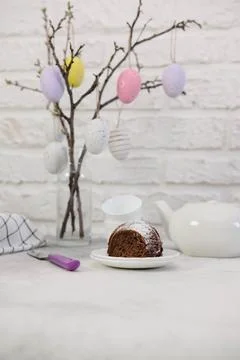 Easter background with eggs and spring branches. Happy Easter. Table setting  Stock Photos