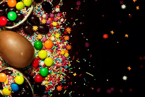 Easter background with eggs and sweets, top view Stock Photos