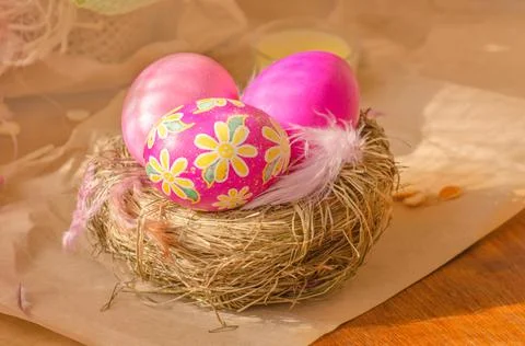Easter background with eggs in nest. Stock Photos