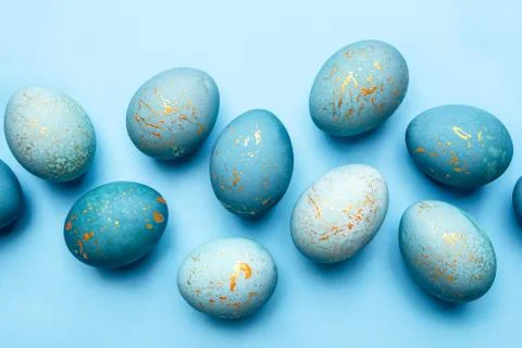 Easter background of eggs painted in blue color. Stock Photos