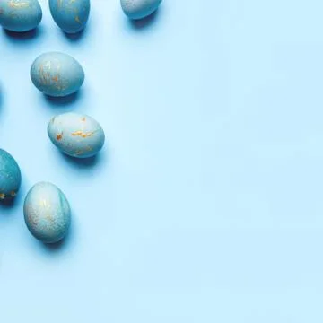 Easter background of eggs painted in blue color. Stock Photos