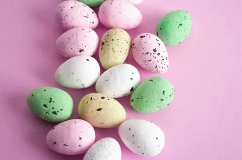 Easter background, eggs on pink backdrop, Greeting card decoration.Pastel col Stock Photos