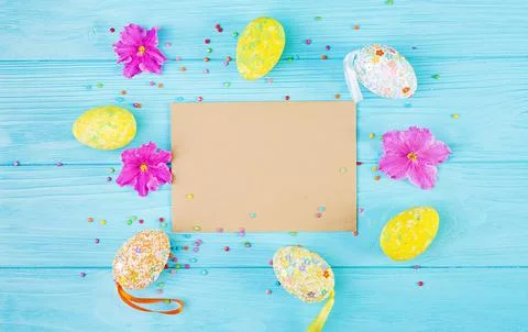 Easter background with flowers and easter eggs. Top view Stock Photos
