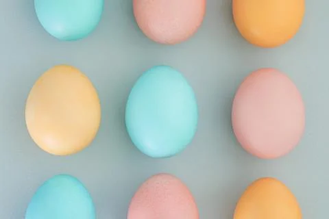 Easter background from multi-colored Easter eggs. top view, flat lay Stock Photos