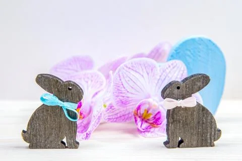 Easter background with rabbit and flowers . Stock Photos