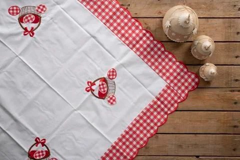 Easter background with a tablecloth and three chickens Stock Photos