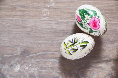 Easter background with two painted eggs. View from above with copy space. Stock Photos