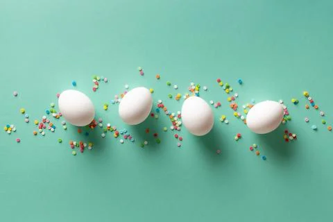Easter background with white eggs on a blue background Stock Photos