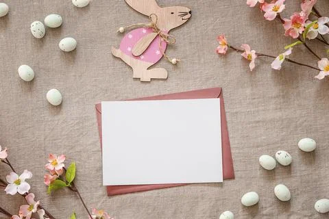 Easter background with white paper blank. Stock Photos