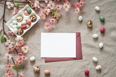 Easter background with white paper blank. Stock Photos