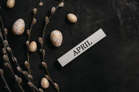 Easter background with willow,eggs and april inscription Stock Photos