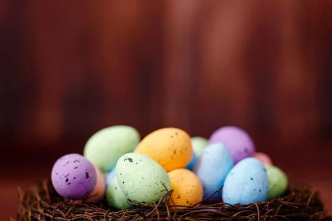 Easter background with yellow chicks and eggs. Easter holidays. Stock Photos