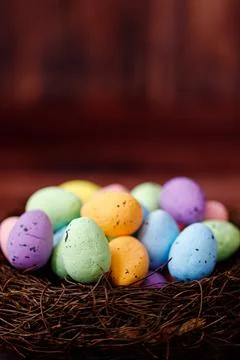 Easter background with yellow chicks and eggs. Easter holidays. Stock Photos