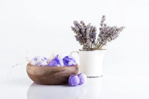 Easter background.Dry lavender and easter eggs on a white background Stock-Fotos