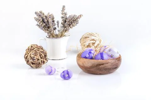 Easter background.Dry lavender and easter eggs on a white background Stockfoto's