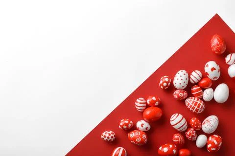 Easter backgrounds, geometric Easter red and white eggs on a white-red Stock Photos