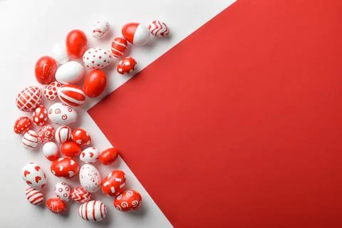 Easter backgrounds, geometric Easter red and white eggs on a white-red Stock Photos