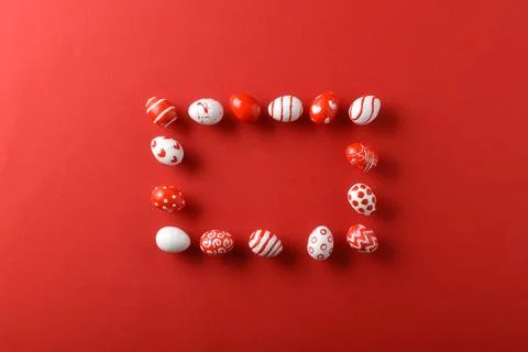 Easter backgrounds with a rectangular frame of Easter red and white eggs on a Stockfoto's