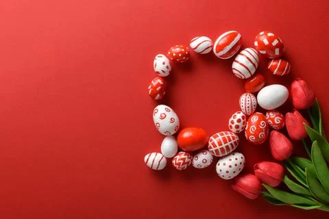 Easter backgrounds with a round frame and red tulips of Easter red and whit.. Stock Photos