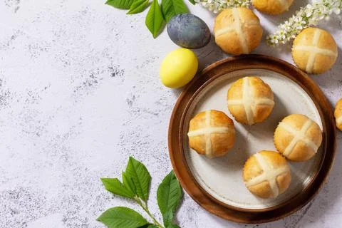 Easter baking. Homemade Easter traditional hot cross buns on a gray stone tab Stock Photos