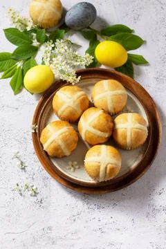 Easter baking. Homemade Easter traditional hot cross buns on a gray stone tab Stock Photos