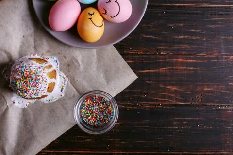 Easter baking with icing and colored powder and eggs. Preparing for the holid Stock Photos