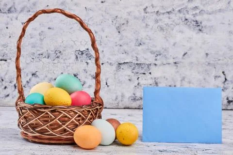 Easter basket and empty card. Stock Photos