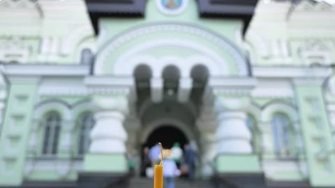 Easter basket with cake, eggs and candles on church background Stock Footage 274842914