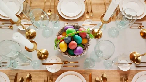 Easter basket with cloured eggs for a spring celebration. Cute table decoration. Stock Footage 158247458