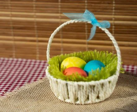 Easter basket with colored eggs. 写真素材
