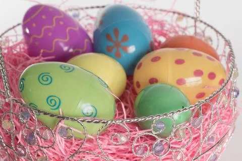 Easter basket with colorful easter eggs Stock-Fotos