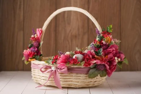 Easter basket with decorated eggs Stock Photos