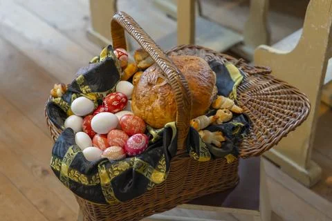 Easter basket with eggs and bread for blessing Stock Photos