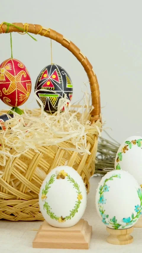 Easter basket with eggs and a green screen phone on a white background. Chroma Stock Footage 301997924