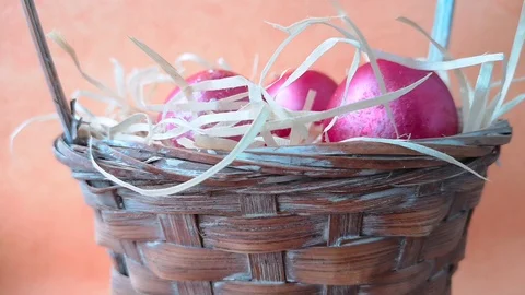 Easter basket with eggs and straw Stock Footage 106253979