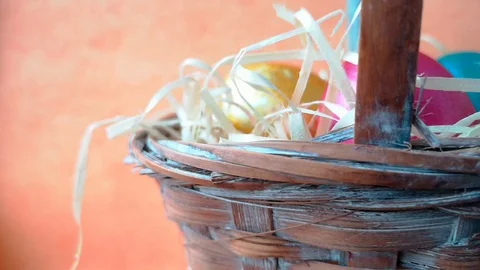Easter basket with eggs and straw Stock Footage 106253981