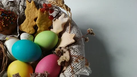Easter basket with eggs cake dried flower reveal Stock Footage 105099664
