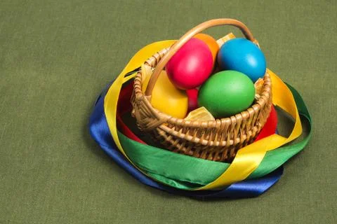Easter basket on a green background. Stock Photos