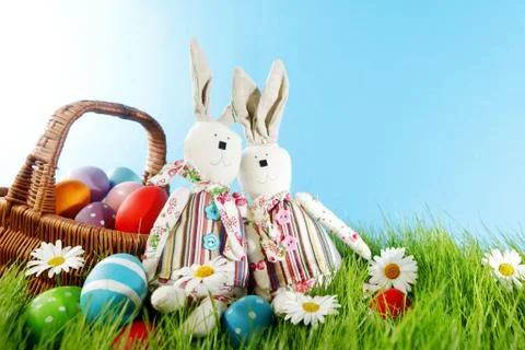 Easter basket on meadow Stock Photos