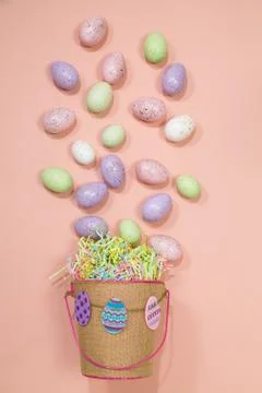 Easter basket spills eggs Stock Photos