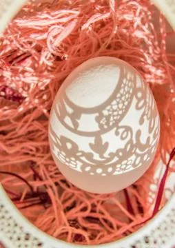 Easter. A beautiful Easter card with an openwork vertical oval frame through  Foto stock