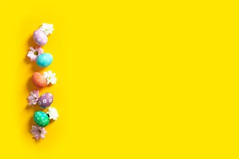 Easter beautiful flat lay with copy space with colorful eggs. Copy space Stock-Fotos