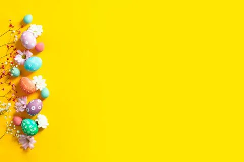 Easter beautiful flat lay with copy space with colorful eggs and flowers 스톡 사진