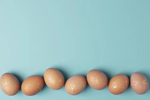 Easter beige egg on a blue background. Flat lay, copy space. beautiful Stock Photos